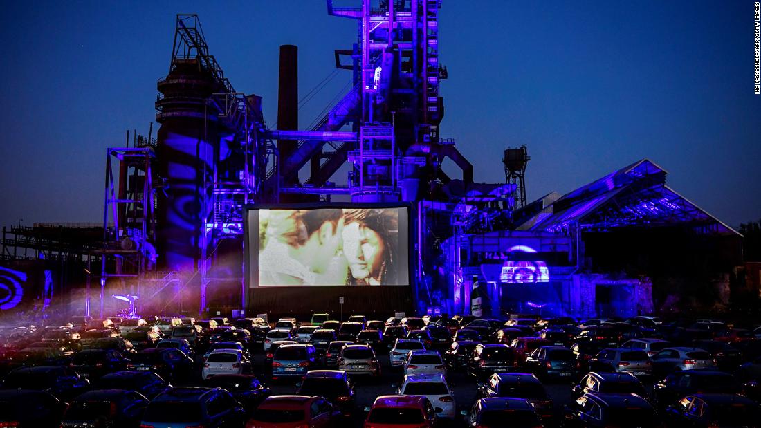 Cars sit at a newly opened drive-in cinema in Dortmund, Germany, on April 17. It&#39;s in front of a former blast furnace.