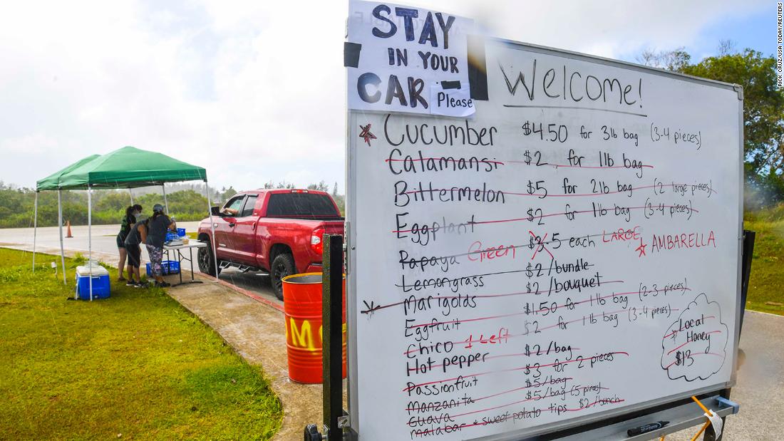 Items are crossed out on a whiteboard during a drive-thru produce sale at the Farmer&#39;s Co-op in Dededo, Guam, on April 23. &lt;a href=&quot;https://www.guampdn.com/story/money/2020/04/21/guam-farmers-market-farm-totable/5169151002/&quot; target=&quot;_blank&quot;&gt;The event,&lt;/a&gt; put together by the nonprofit group Farm to Table Guam, offered produce grown by local farmers and was set to run for four hours. But it was cut short because the majority of the produce was sold in about half the time. 