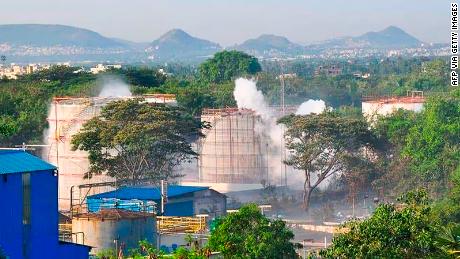 Smoke rises from the chemical plant after the leak.