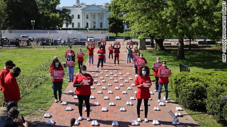National Nurses United members held a vigil in front of the White House in May, then surrounded by 88 pairs of shoes for 88 nurses who&#39;d died from coronavirus. 