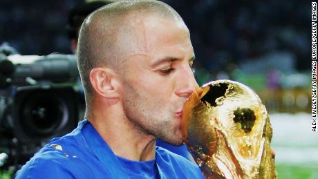 Del Piero kisses the World Cup trophy following his team&#39;s victory in a penalty shootout in 2006.