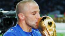 Del Piero kisses the World Cup trophy following his team's victory in a penalty shootout in 2006.