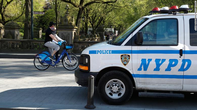 New York City police patrol Central Park on May 2 to ensure people are abiding by socal distancing protocols. 