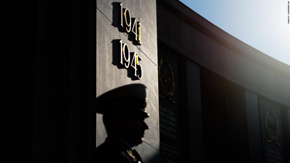 A Russian soldier stands at the Soviet War memorial in Berlin.