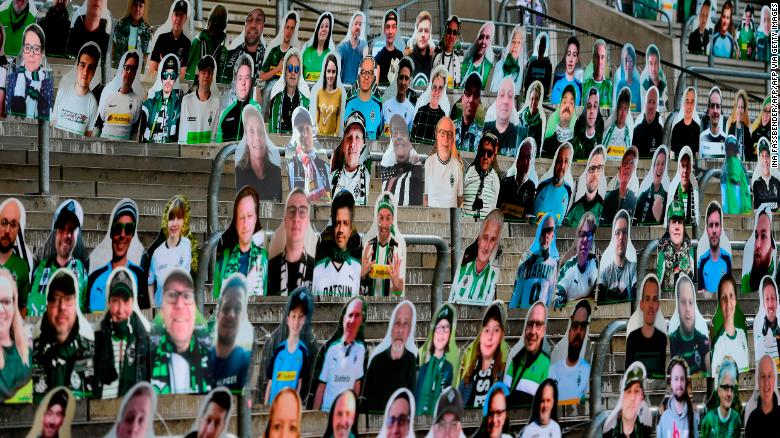 Cardboard cut-outs with portraits of Borussia Moenchegladbach's supporters are seen at the Borussia Park stadium.