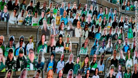 Cardboard cut-outs with portraits of Borussia Moenchegladbach&#39;s supporters are seen at the Borussia Park stadium.