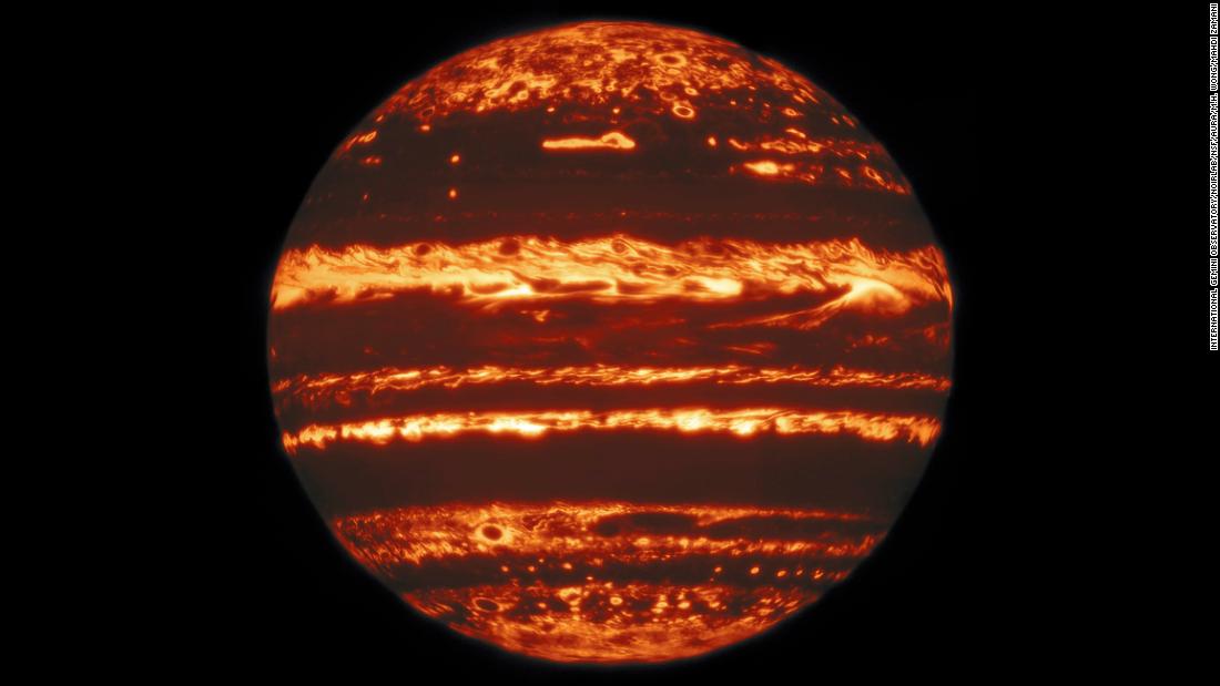 This jack-o-lantern-esque view of Jupiter is a mosaic of images taken by the Gemini North telescope in Hawaii. The bright spots represent Jupiter&#39;s internal heat escaping through holes in the planet&#39;s massive cloud cover. 