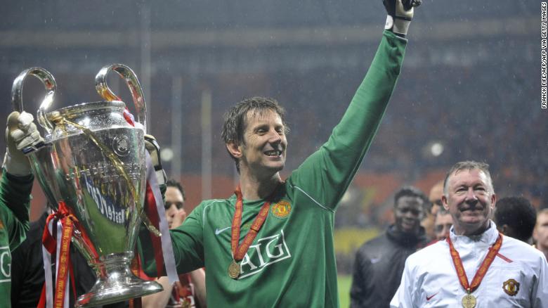 Van der Sar holds up the Champions League trophy after Manchester United beat Chelsea in the final on May 21, 2008.