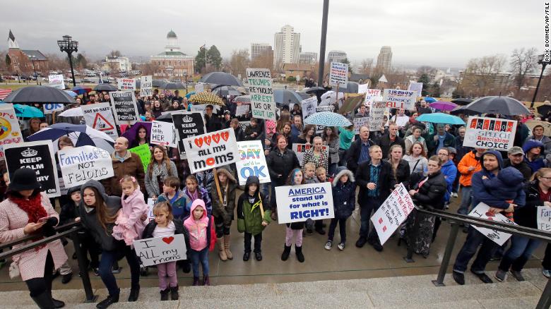 A group of pro-polygamy protesters rally at the Utah state Capitol on February 10, 2017.