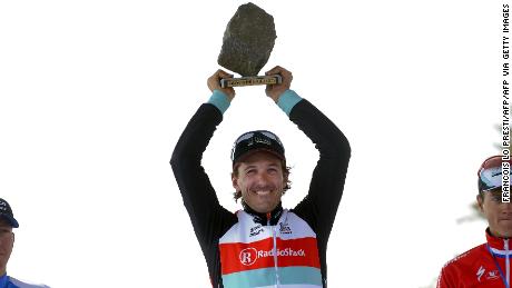 Switzerland&#39;s Fabian Cancellara (Radioschack team) holds his trophy, next to Belgium&#39;s Sep Vanmarcke (L) (Blanco team) and Netherlands&#39; Niki Terpstra (Omega team), after winning the 111th edition of the Paris-Roubaix one-day classic cycling race, on April 7, 2013, in Roubaix, northern France. Cancelllara won the prestigious race for the third time. The winner from 2006 and 2010 took the gruelling 254km &quot;Queen of the Classics&quot; race ahead of Vanmarcke and Terpstra. AFP PHOTO / FRANCOIS LO PRESTI        (Photo credit should read FRANCOIS LO PRESTI/AFP via Getty Images)