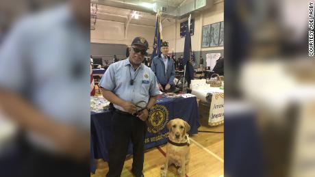 Not just another patient: A nurse cared for a blind veteran and his guide dog while they were locked down in the hospital