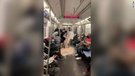 A TikTok video shows Josh Popkin spilling a large tub of cereal and milk on the subway.