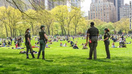 Park enforcement officers stand watch in New York City&#39;s Central Park during the coronavirus pandemic on May 2, 2020.