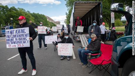 UNITED STATES - MAY 11: A group of truck drivers demonstrate along Constitution Avenue as they call for the Department of Justice to investigate illicit price gouging by freight brokers on Monday, May 11, 2020. (Photo by Caroline Brehman/CQ-Roll Call, Inc via Getty Images/Pool)