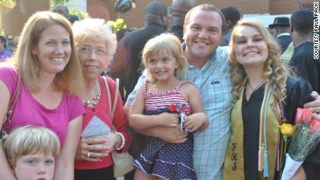 Principal Paul Pack, his wife Jessica and children Danny and Hailey with Susan Rokus at Katy Greiner&#39;s graduation.