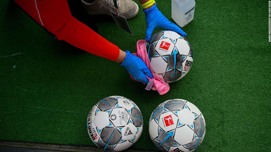 Soccer balls are disinfected at a professional match in Düsseldorf, Germany, on May 16. Germany&#39;s Bundesliga was &lt;a href=&quot;https://www.cnn.com/2020/05/16/sport/germany-bundesliga-return-football-spt-intl/index.html&quot; target=&quot;_blank&quot;&gt;the first major European soccer division to return to action.&lt;/a&gt;