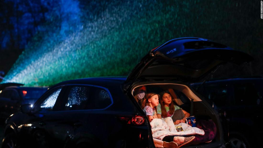People watch a showing of &quot;Trolls World Tour&quot; at the Four Brothers Drive-In movie theater in Amenia, New York, on May 15.