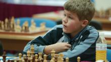 Carlsen a participat la turneul de șah din Dubai Open în 2004, la 13 ani.