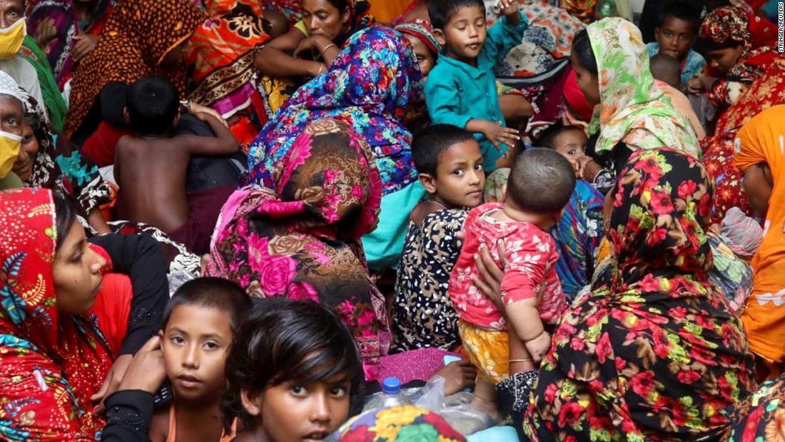 People in Gabura, Bangladesh, gather at a cyclone center for protection before Amphan made landfall on Wednesday, May 20.