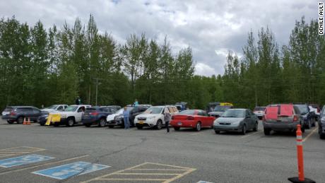More than 80 cars showed up to protest a previous decision by an Alaska school board to remove five books off reading lists.