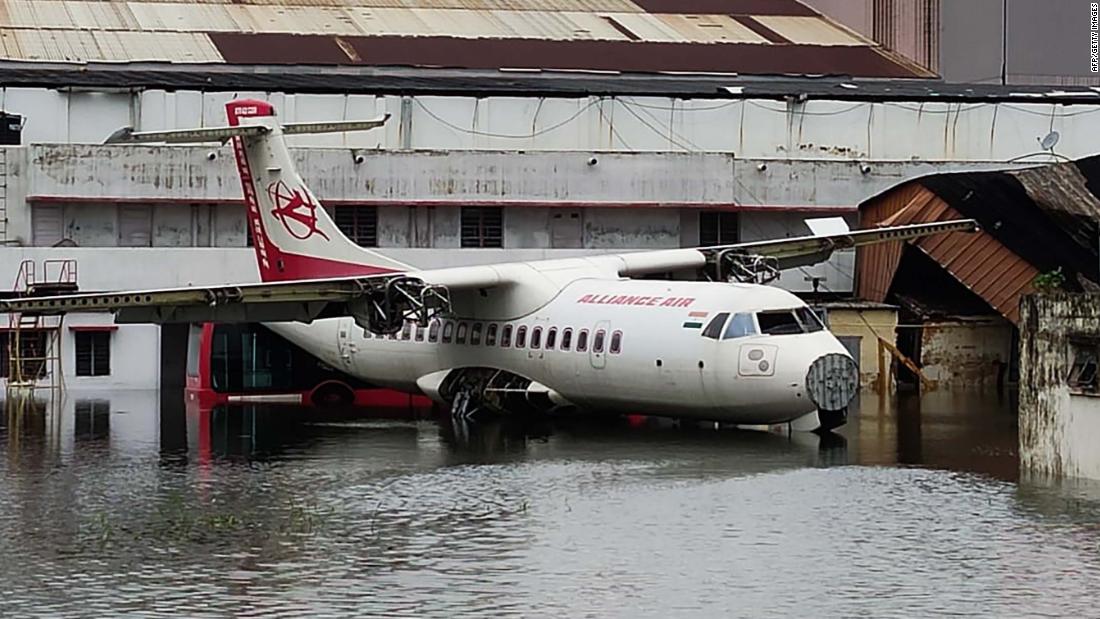 An aircraft is parked at the flooded Netaji Subhas Chandra Bose International Airport in Kolkata.