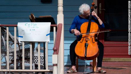 Cellist Jodi Beder plays on her front porch in Mount Rainier, Maryland. You can learn an instrument, too. 