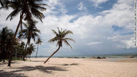 A stretch of Hua Hin beach in Thailand lies empty of visitors on May 19, 2020. - Thailand&#39;s economy is expected to shrink more than six percent this year as the coronavirus outbreak shatters the country&#39;s crucial tourism industry, with all flights into the country banned until the end of June. (Photo by Jack TAYLOR / AFP) (Photo by JACK TAYLOR/AFP via Getty Images)