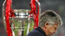 Carlo Ancelotti walks by the throphy at the end of the Champions League final between AC Milan and Liverpool in Istanbul.