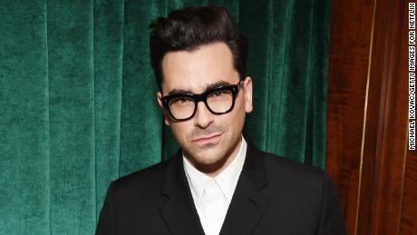 Dan Levy is encouraging face coverings as an act of kindness