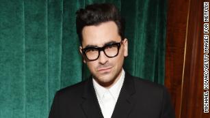 Dan Levy is encouraging face coverings as an act of kindness