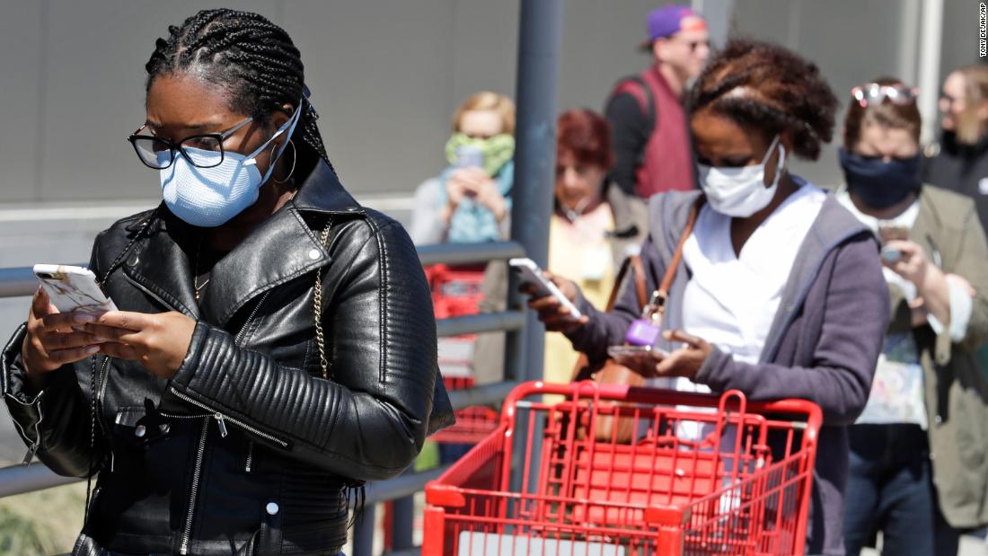 Path ahead for pandemic could be shaped by masks while the US death toll inches closer to 100,000