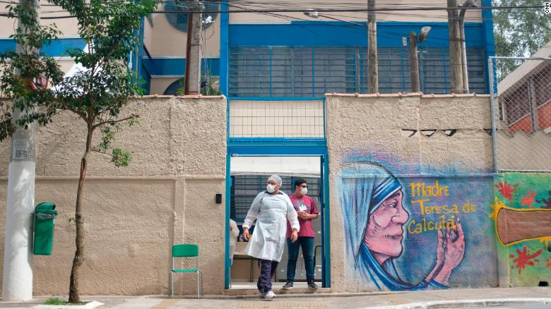 A school in the sprawling favela of Paraisopolis is being used as an isolation center for people with coronavirus.