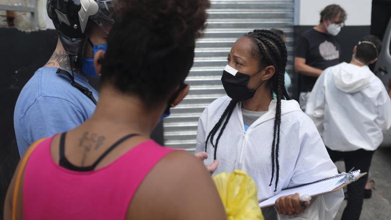 "Cases can be tough," says Renata Alves, a volunteer health worker with the G10 Favela aid group.