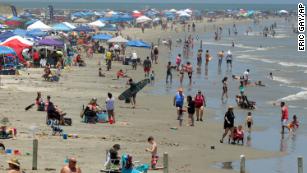 Covid-19 cases surge in some states as Americans celebrate Memorial Day weekend