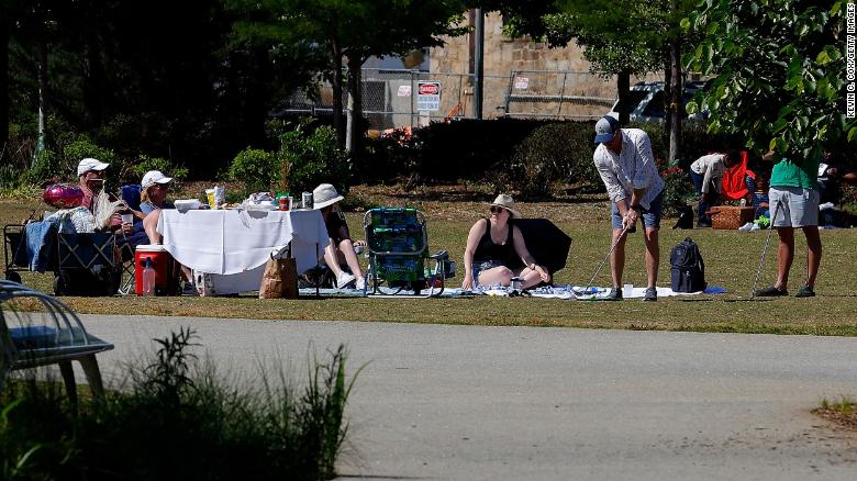 Park-goers enjoy a picnic at Historic Fourth Ward Park in Atlanta.
