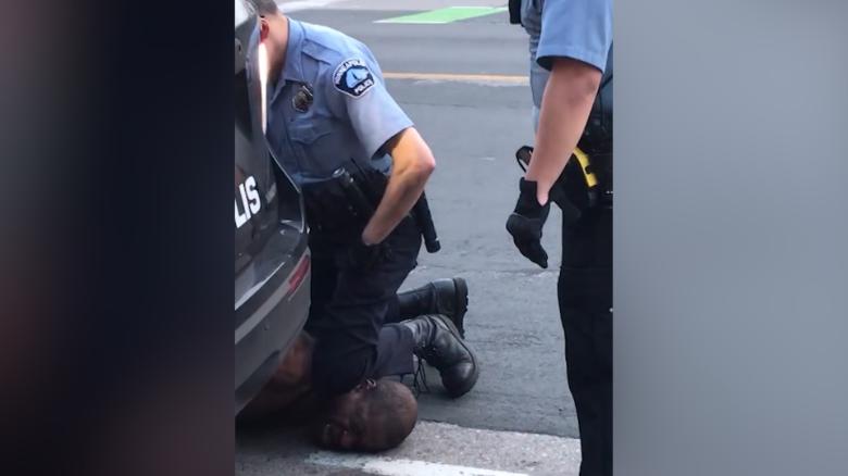 Video shows Minneapolis officer kneeling on black man's neck