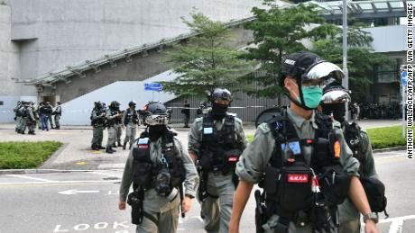 Riot police patrol outside the Legislative Council in Hong Kong on May 27, 2020, ahead of a debate over a law that bans insulting China&#39;s national anthem.