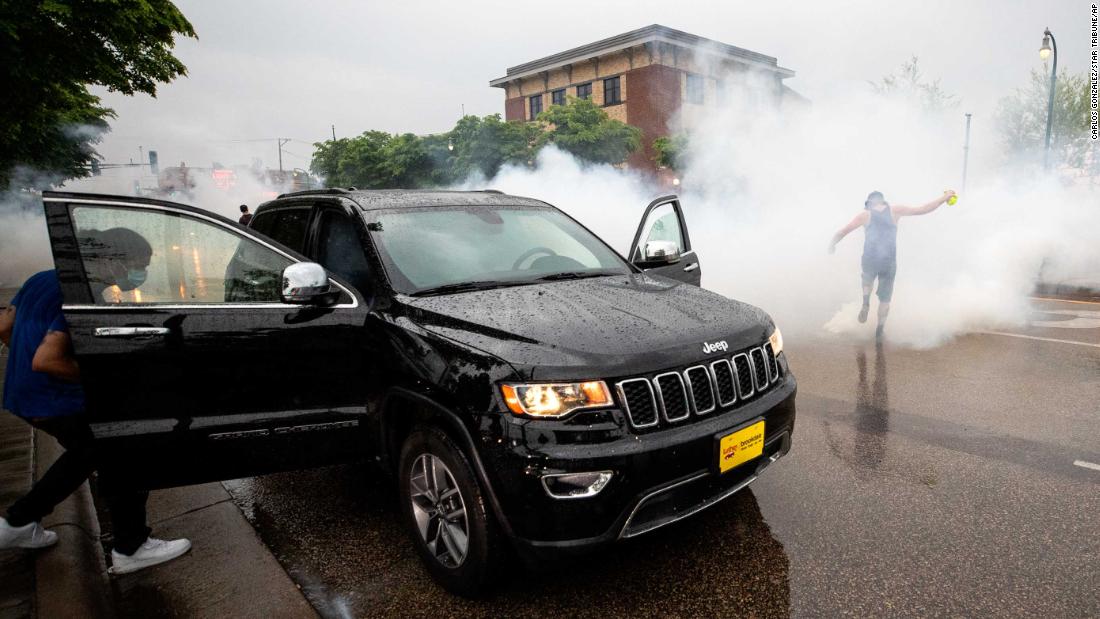 A car in Minneapolis is hit with tear gas on May 26.