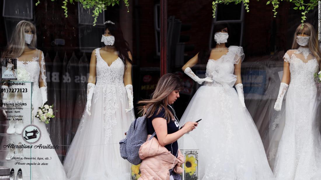 A woman walks past a bridal boutique in Dublin on May 19.