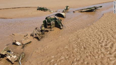 Debi Hartley and Graham Holden found the World War II aircraft buried on a beach in England.