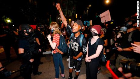 Why black and white protesters say they&#39;re angry