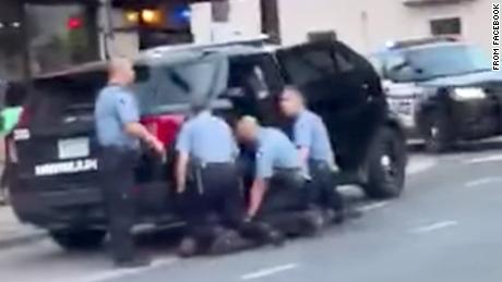 New video appears to show George Floyd being kneeled on by 3 officers