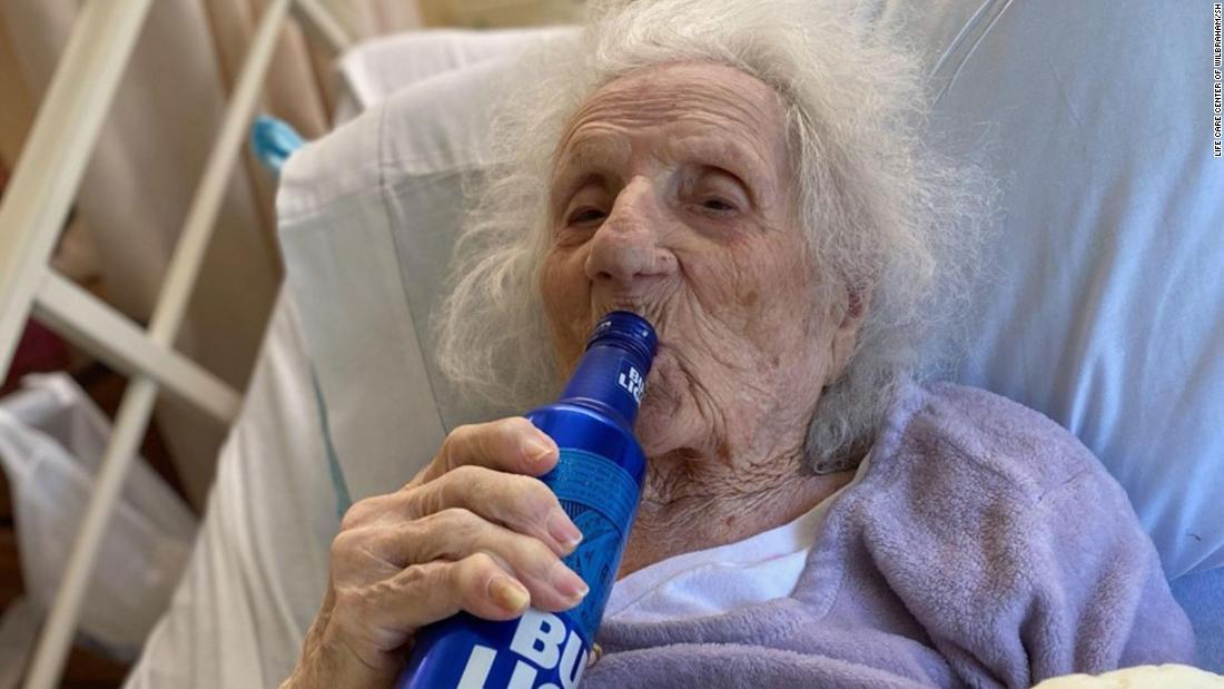 103-year-old woman celebrates beating Covid-19 with a cold beer