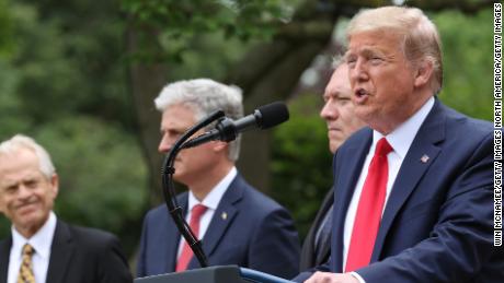 WASHINGTON, DC - MAY 29: U.S. President Donald Trump is flanked by administration officials while speaking about U.S. relations with China in the Rose Garden at the White House May 29, 2020 in Washington, DC. President Trump did not take questions regarding the current situation in Minneapolis following the death of George Floyd and todays arrest of Derek Chauvin the former Minneapolis police officer who knelt on Floyd&#39;s neck for an extended time causing him to die.   (Photo by Win McNamee/Getty Images)