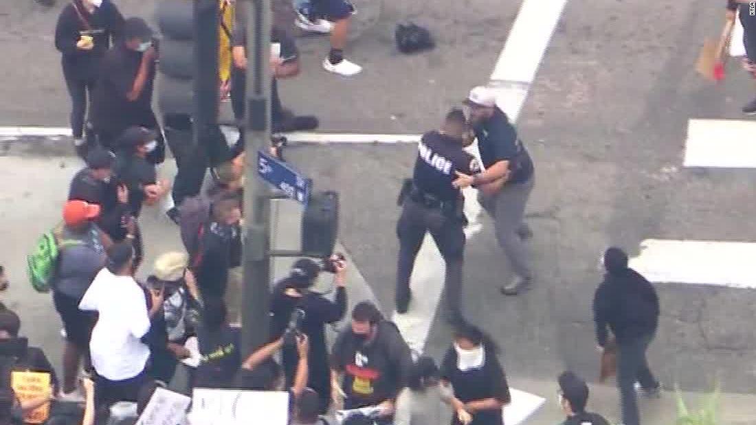 Police Officer Attacked During Protest In Los Angeles Cnn Video