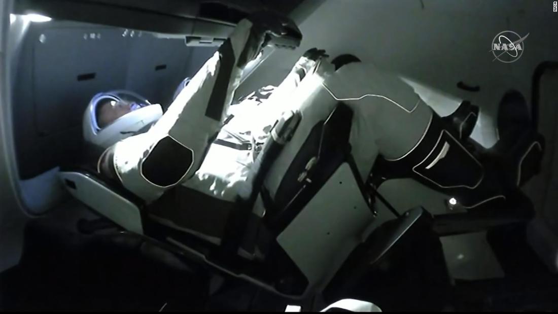 US astronauts disembark SpaceX's Crew Dragon and board the International Space Station