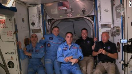 US astronauts disembark SpaceX&#39;s Crew Dragon and board the International Space Station