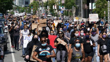 Health experts and state leaders fear coronavirus could spread rapidly during mass protests in US