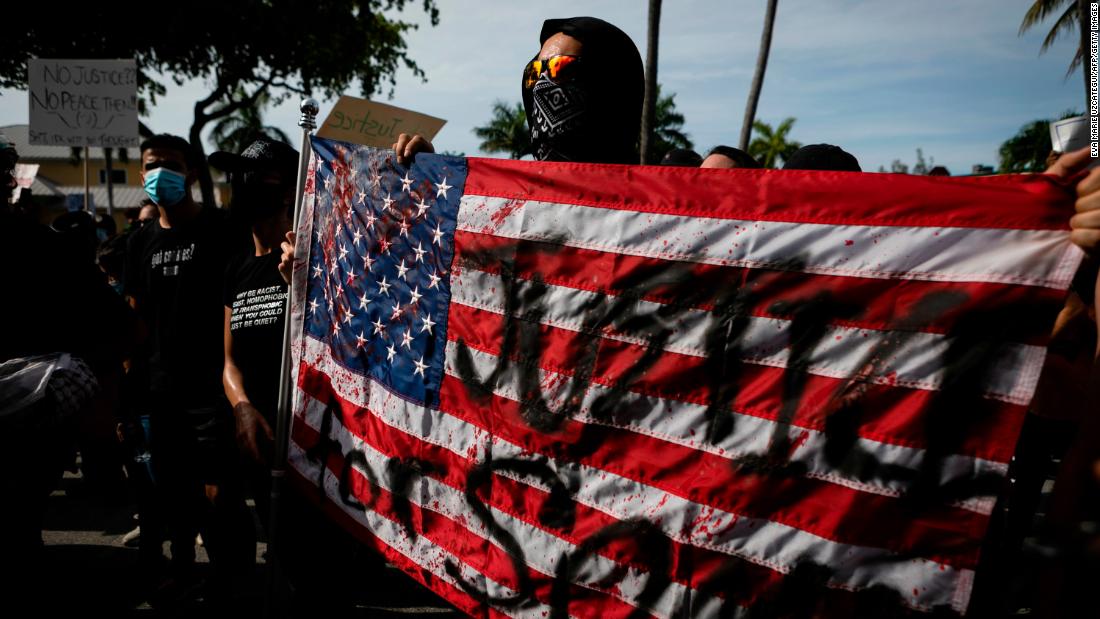 Protesters march during a rally in Fort Lauderdale, Florida, on May 31.