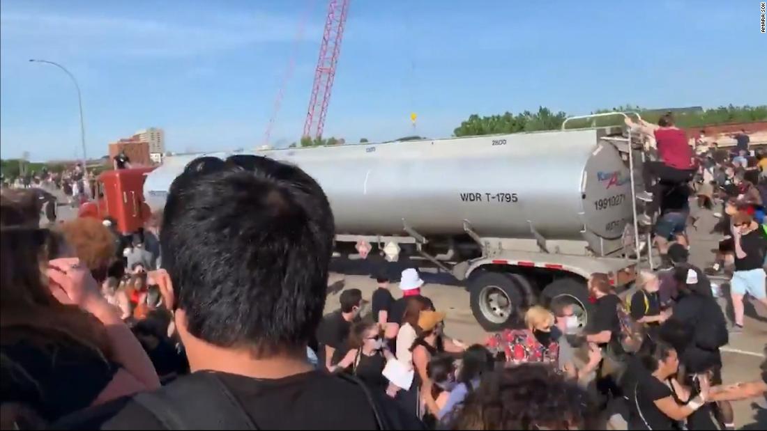 Video shows tractor-trailer drive through protesters